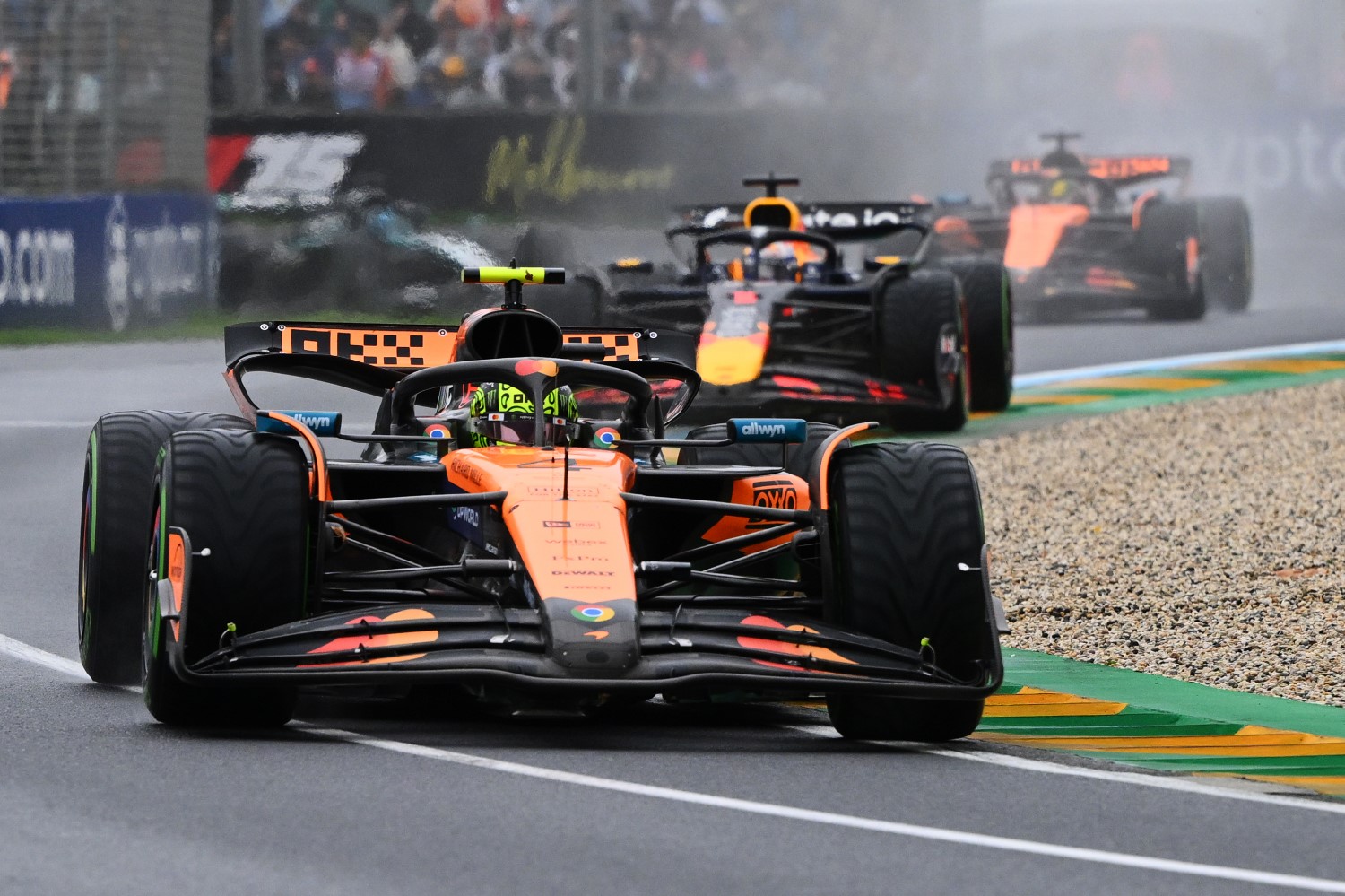 Lando Norris of Great Britain driving the (4) McLaren MCL39 Mercedes leads Max Verstappen of the Netherlands driving the (1) Oracle Red Bull Racing RB21 and Oscar Piastri of Australia driving the (81) McLaren MCL39 Mercedes during the F1 Grand Prix of Australia at Albert Park Grand Prix Circuit on March 16, 2025 in Melbourne, Australia. (Photo by Clive Mason/Getty Images for McLaren)