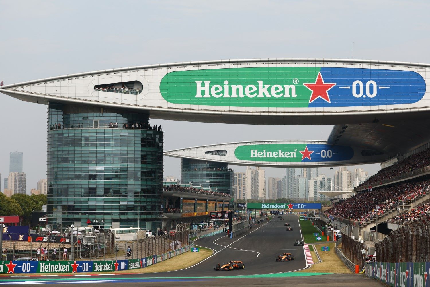 Oscar Piastri of Australia driving the (81) McLaren MCL39 Mercedes leads Lando Norris of Great Britain driving the (4) McLaren MCL39 Mercedes and George Russell of Great Britain driving the (63) Mercedes AMG Petronas F1 Team W16 on track during the F1 Grand Prix of China at Shanghai International Circuit on March 23, 2025 in Shanghai, China. (Photo by Clive Rose/Getty Images for McLaren)