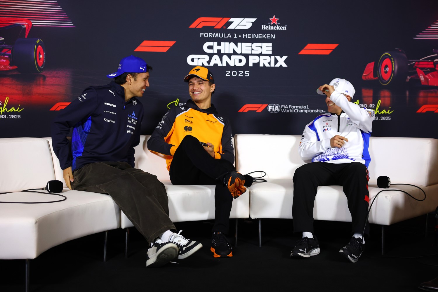 Alexander Albon of Thailand and Williams Lando Norris of Great Britain and McLaren and Isack Hadjar of France and Visa Cash App Racing Bulls in the Drivers Press Conference during previews ahead of the F1 Chinese GP at Shanghai International Circuit on March 20, 2025 in Shanghai, China. (Photo by Clive Rose/Getty Images) // Getty Images / Red Bull Content Pool