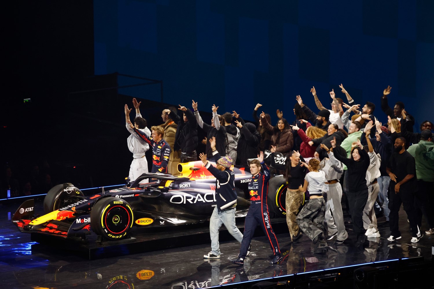 Max Verstappen of the Netherlands and Oracle Red Bull Racing and Liam Lawson of New Zealand and Oracle Red Bull Racing wave to the crowd as the Oracle Red Bull Racing team present their livery during F1 75 Live at The O2 Arena on February 18, 2025 in London, England. (Photo by Bryn Lennon - Formula 1/Formula 1 via Getty Images) // Getty Images / Red Bull Content Pool //