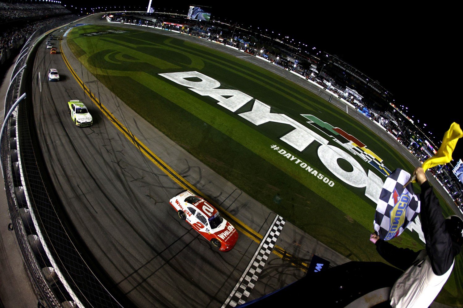 Jesse Love, driver of the #2 Whelen Chevrolet takes the checkered flag under caution to win the NASCAR Xfinity Series United Rentals 300 at Daytona International Speedway on February 15, 2025 in Daytona Beach, Florida. (Photo by Sean Gardner/Getty Images)