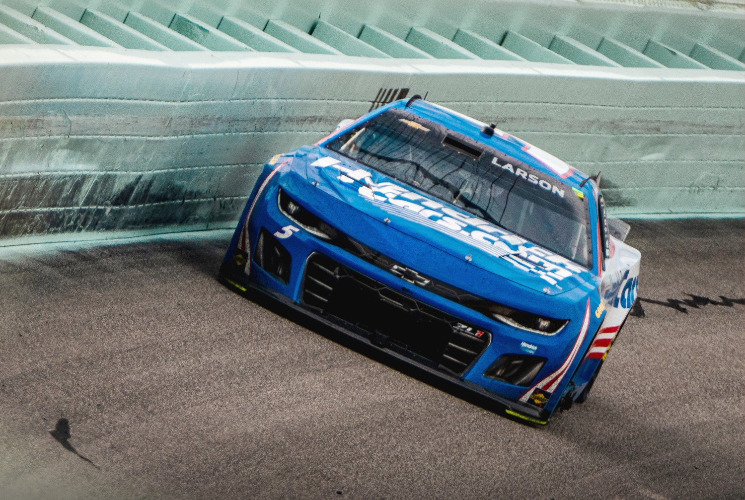 Kyle Larson, driver of the #5 HendrickCars.com Chevrolet, leads the NASCAR Cup Series Straight Talk Wireless 400 at Homestead-Miami Speedway on March 23, 2025 in Homestead, Florida. (Photo by Getty Images for NASCAR)