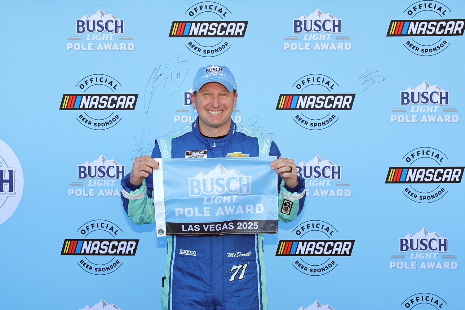 Michael McDowell, driver of the #71 Group 1001 Chevrolet, poses for photos after winning the pole award during qualifying for the NASCAR Cup Series Pennzoil 400 at Las Vegas Motor Speedway on March 15, 2025 in Las Vegas, Nevada. (Photo by Jonathan Bachman/Getty Images for NASCAR)