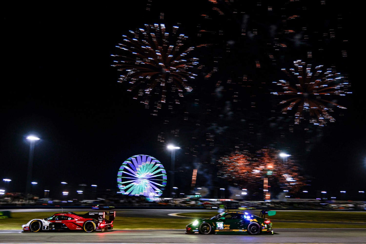 #7: Porsche Penske Motorsports, Porsche 963, GTP: Felipe Nasr, Nick Tandy, Laurens Vanthoor, Fireworks at halfway. LAT Photo for IMSA