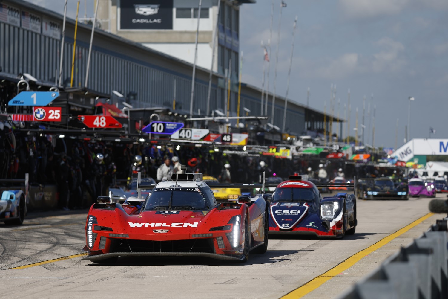 #31: Cadillac Whelen, Cadillac V-Series.R, GTP: Jack Aitken, Earl Bamber, Frederik Vesti pit stop at Sebring. LAT Photo for IMSA