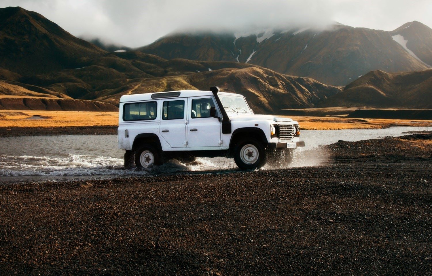 Land Rover Photo by Jon Flobrant on Unsplash