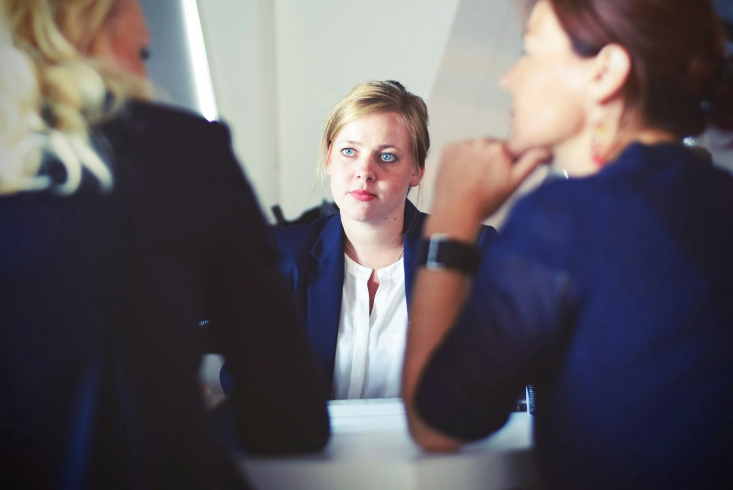 Lawyer Helping Client. Photo by Tim Gouw on Unsplash