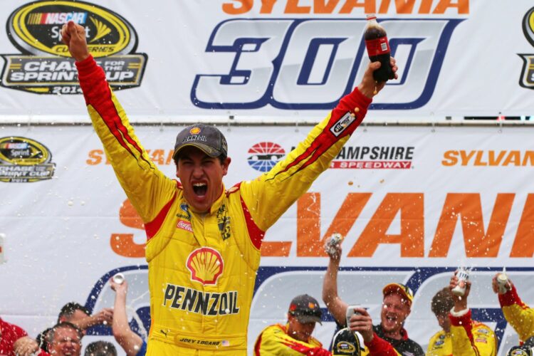 Penske re-signs Logano