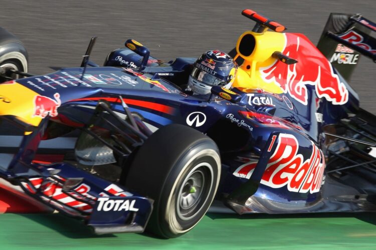 Vettel beats Button for pole in Japan