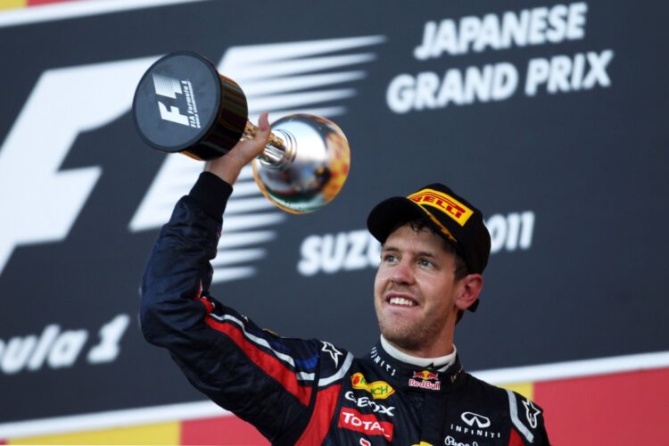 Japan: Button wins race, Vettel wins title