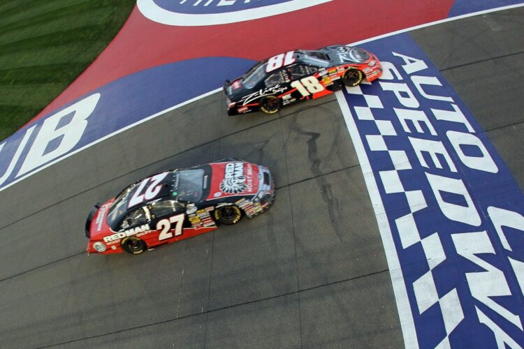 Kyle Busch defeats Biffle and Logano on last lap