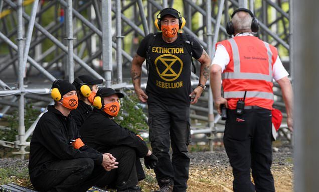 Climate change protesters arrested during British GP