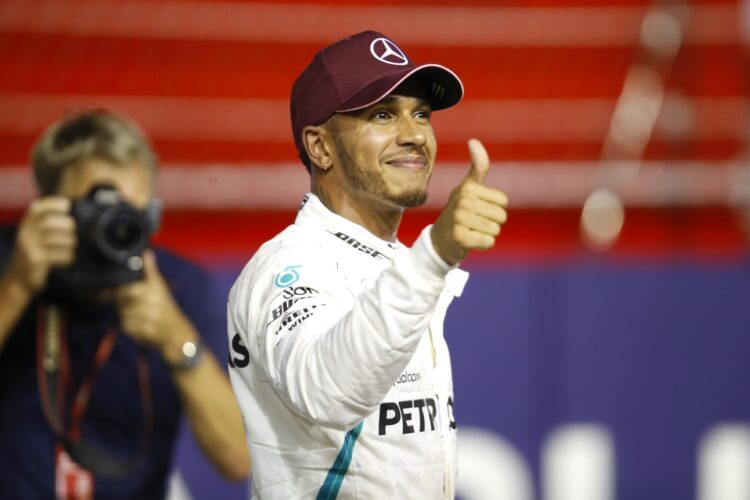 Hamilton flies to pole in Singapore