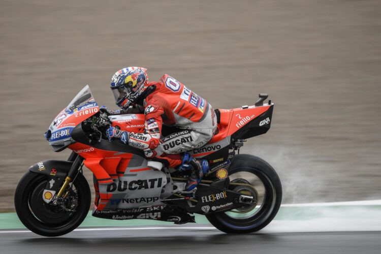 Dovizioso wins MotoGP finale in horrible wet conditions