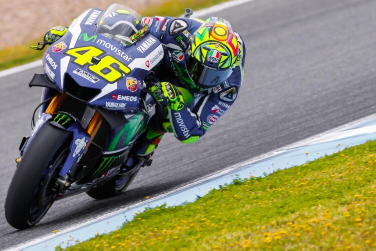 Rossi wins three-way fight for 52nd pole position