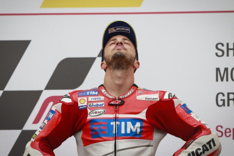 Dovizioso storms Sepang in torrential conditions