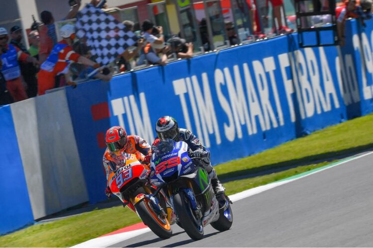 Lorenzo wins last-lap photo-finish over Marquez