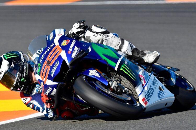 Lorenzo holds off charging Marquez in season finale