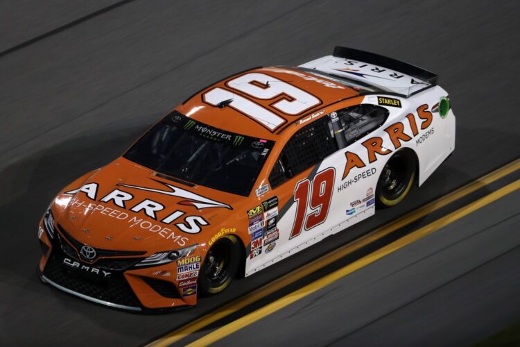 Carl Edwards helps Suarez during Friday’s practice at Atlanta