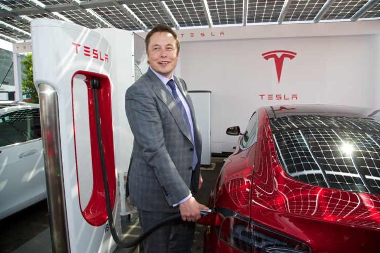 Tesla stock hits all-time high after delivering record number of  cars