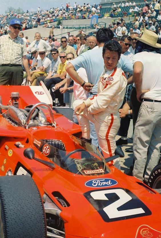 Andretti looks over the Lotus 64